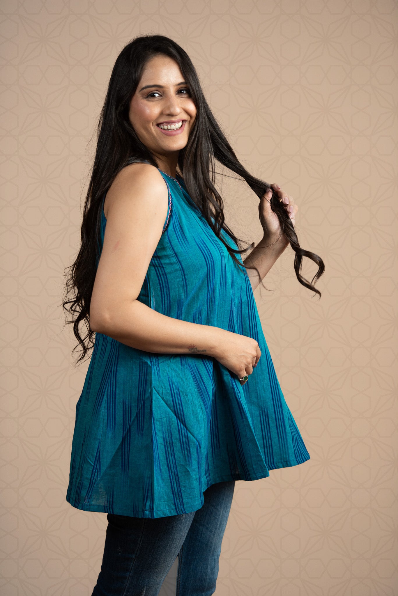 Peacock Blue Ikkat Haulter 12 Kali Short Kurti