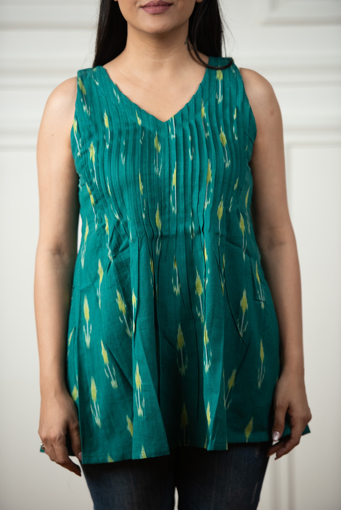 Rama Blue Ikkat Haulter Front Plitted Short Kurti