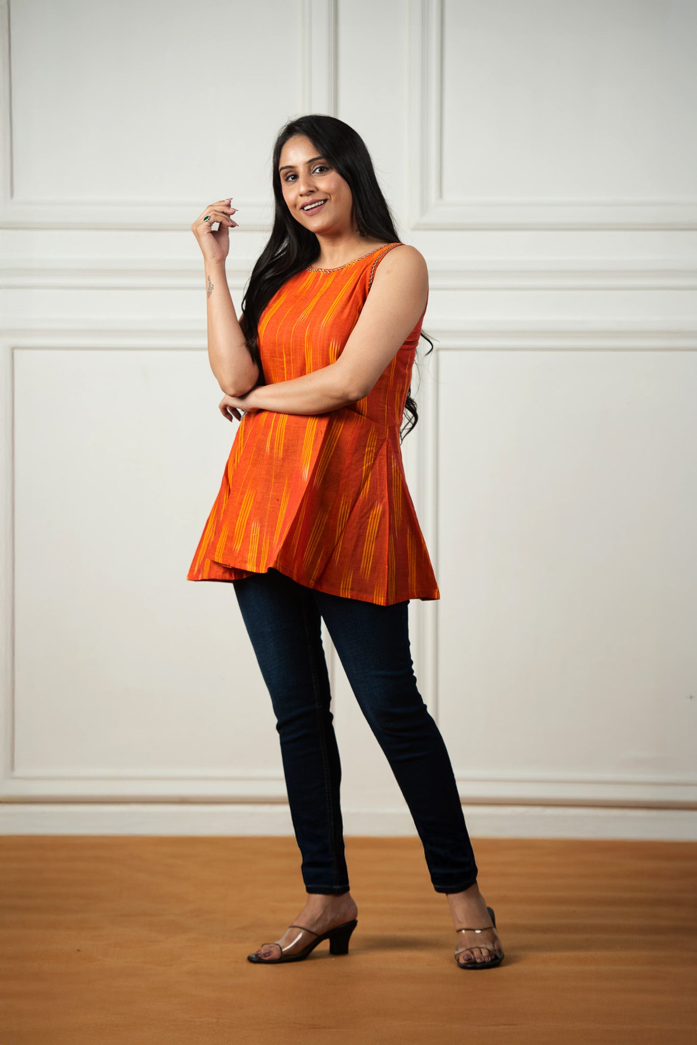 Glossy Orange Ikkat Haulter 12 Kali Short Kurti