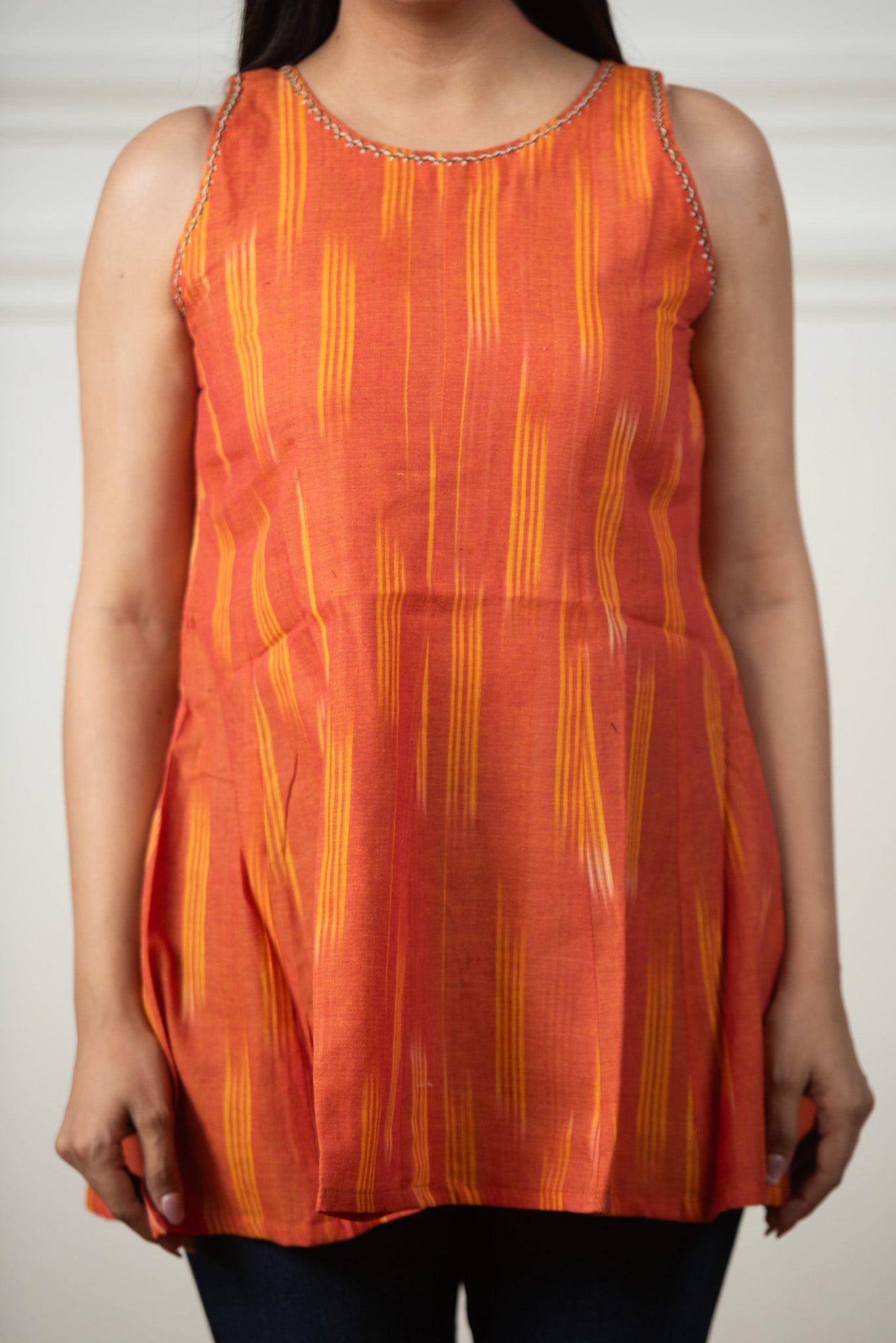 Glossy Orange Ikkat Haulter 12 Kali Short Kurti
