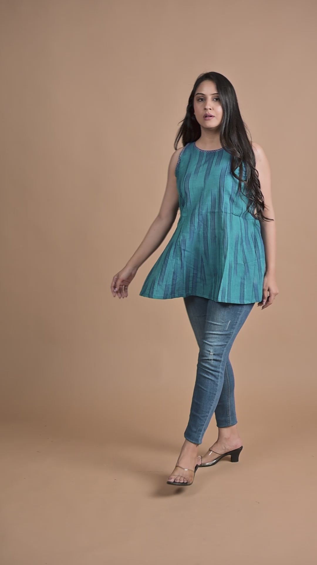 Peacock Blue Ikkat Haulter 12 Kali Short Kurti