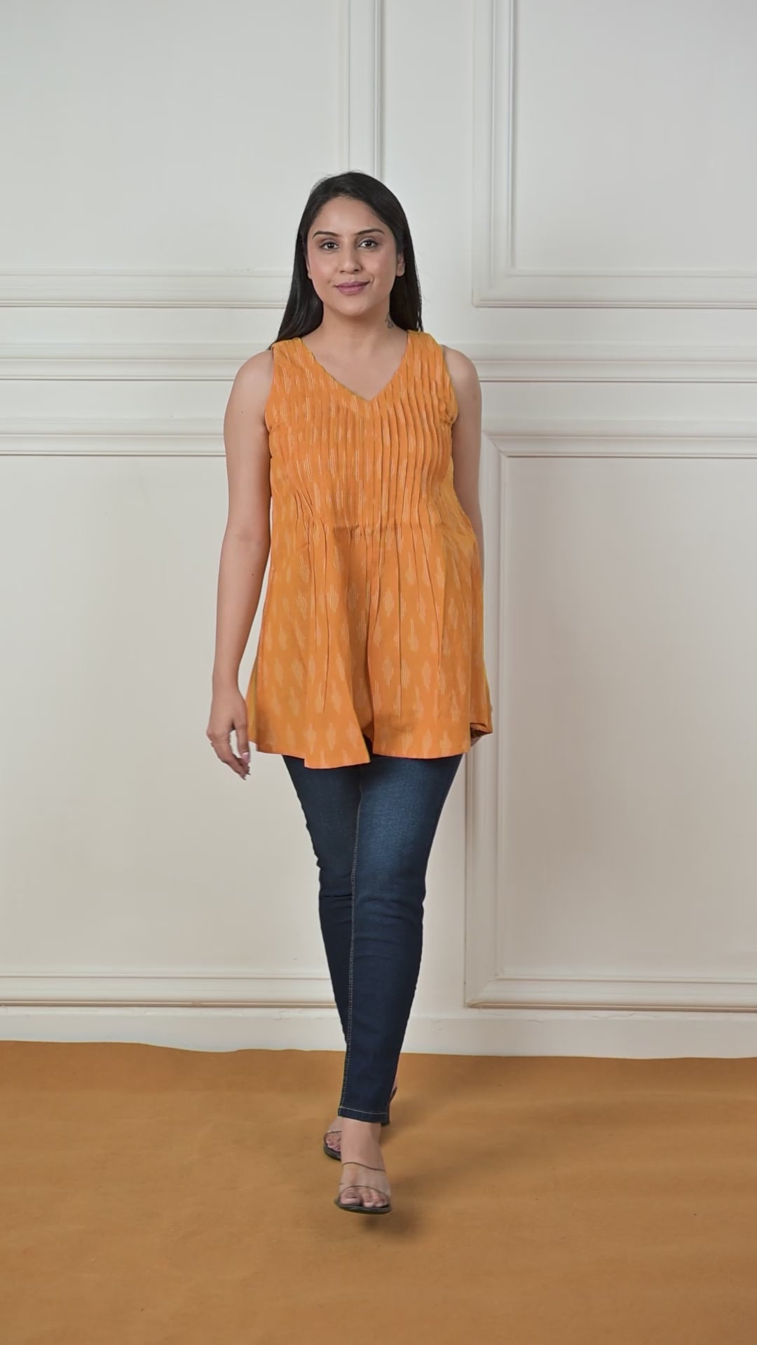 Glossy Orange Ikkat Haulter 12 Kali Short Kurti